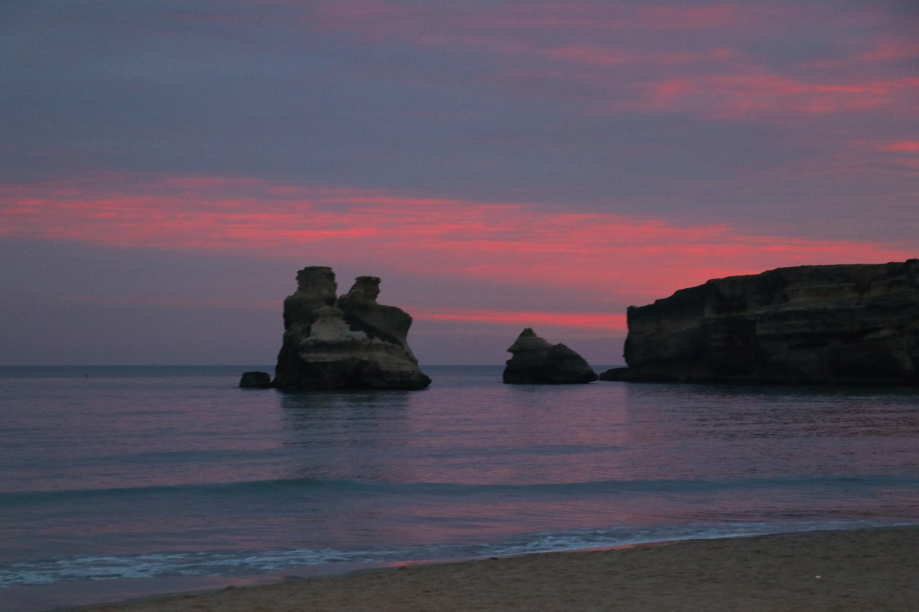 The Due Sorelle sea stacks at dawn in Torre dell’Orso